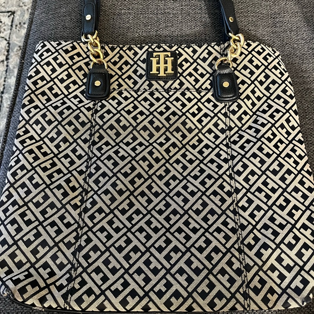 Tommy Hilfiger purse excellent body some wear on handles.